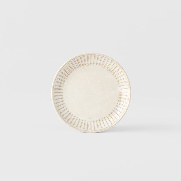 Save on Sauce Dish 9cm / Alabaster Glaze Made in Japan at BEON. A sauce dish featuring a simple line pattern embossed on a soft alabaster white glaze.8.8cm diameter1.7cm heightMade of 'Minoyaki' porcelain, fired at a high temperature and hand finished in Gifu prefecture, Japan. General information & care instructions Our tableware is food safe and can, with some care, be used in the oven, microwave and dishwasher. Sudden changes in temperature (eg. from freezer to oven) are likely to cause thermal shock, wh