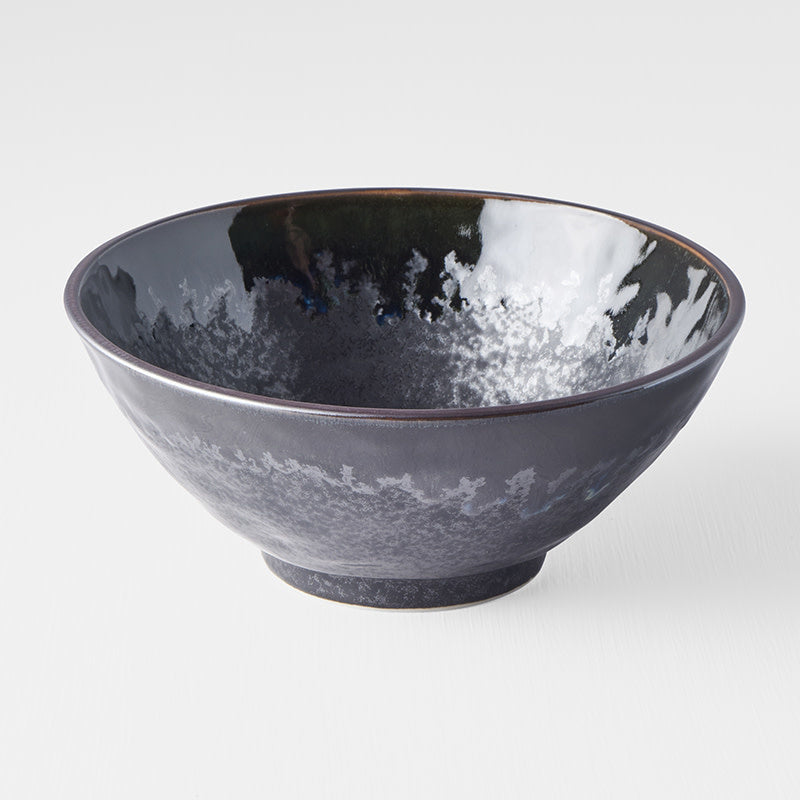Save on Udon Noodle Bowl 20cm / Matt & Shiny Black Glaze Made in Japan at BEON. The Matt & Shiny range is designed and made at the Ichi kiln in Gifu prefecture, Japan.20cm diameter8.5cm heightMade of 'Minoyaki' porcelain, fired at a high temperature and hand finished at the Ichi kiln in Gifu prefecture, Japan. A silvered matt black body, the edge hand-dipped in a rich glossy black. A subtle play of blue and green accents are hidden within the pooling of the glaze. The Ichi kiln has over 70 skilled craftspeo