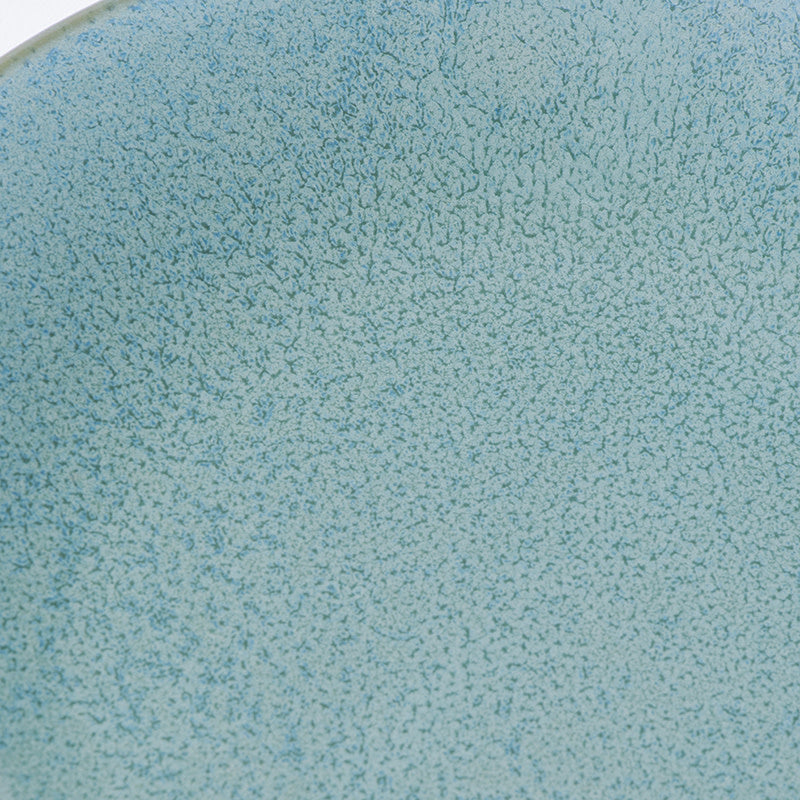 Save on Tapas Plate 17cm / Peacock Glaze Made in Japan at BEON. The Peacock range is designed and made in Gifu prefecture, Japan.17cm diameter2cm heightMade of 'Minoyaki' porcelain, fired at a high temperature and hand finished in Gifu prefecture, Japan. The Peacock glaze features a bold teal blended with a rich, iridescent blue. Each piece has a unique finely dappled pattern determined by its position in the kiln during the firing process. Focusing on simple, practical shapes and with a gloss finish, the P