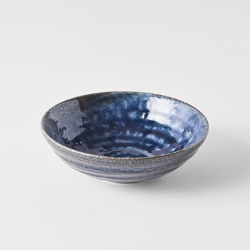 Save on Shallow Bowl 13cm / Midnight Blue Glaze Made in Japan at BEON. The Midnight Blue range is designed and made in Gifu prefecture, Japan.13cm diameterMade of 'Minoyaki' porcelain, fired at a high temperature and hand finished in Gifu prefecture, Japan. Featuring a dark indigo gloss with subtle brown undertones. The glaze runs over a pattern of concentric circles. It works in perfect harmony with the rustic shapes made by this kiln. This kiln is situated in the foot hills of the alpine region of Gifu pr