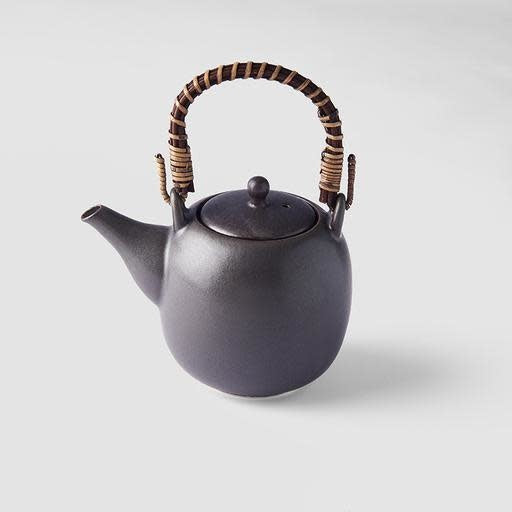 Save on Teapot 500ml / Craft Black Glaze Made in Japan at BEON. The Craft Black range is designed and made in Gifu prefecture, Japan.11.5cm height500ml capacityMade of 'Minoyaki' porcelain and hand finished in Gifu prefecture, Japan. Slight irregularities in size, glaze and texture reflect the artisan nature of the product and are embraced. General information & care instructions Our tableware is food safe and can, with some care, be used in the oven, microwave and dishwasher. Sudden changes in temperature