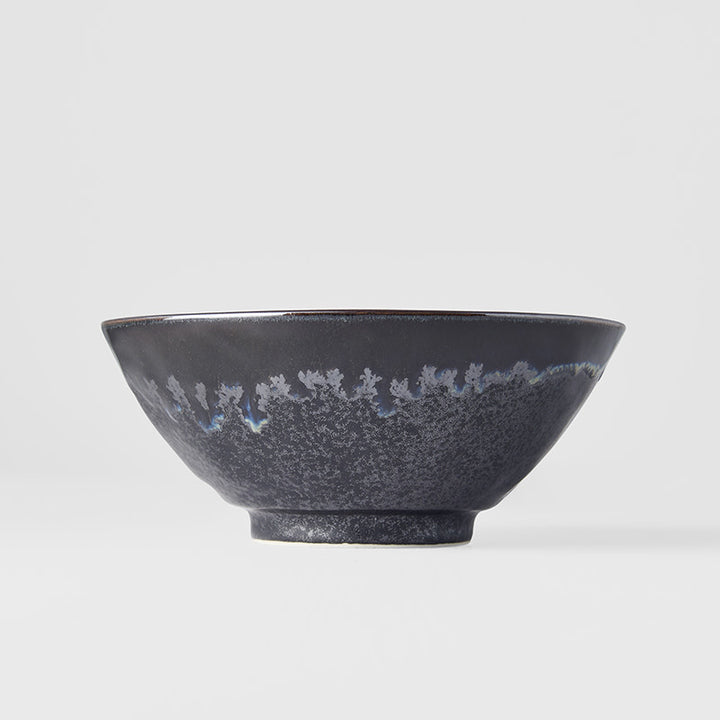 Save on Udon Noodle Bowl 20cm / Matt & Shiny Black Glaze Made in Japan at BEON. The Matt & Shiny range is designed and made at the Ichi kiln in Gifu prefecture, Japan.20cm diameter8.5cm heightMade of 'Minoyaki' porcelain, fired at a high temperature and hand finished at the Ichi kiln in Gifu prefecture, Japan. A silvered matt black body, the edge hand-dipped in a rich glossy black. A subtle play of blue and green accents are hidden within the pooling of the glaze. The Ichi kiln has over 70 skilled craftspeo