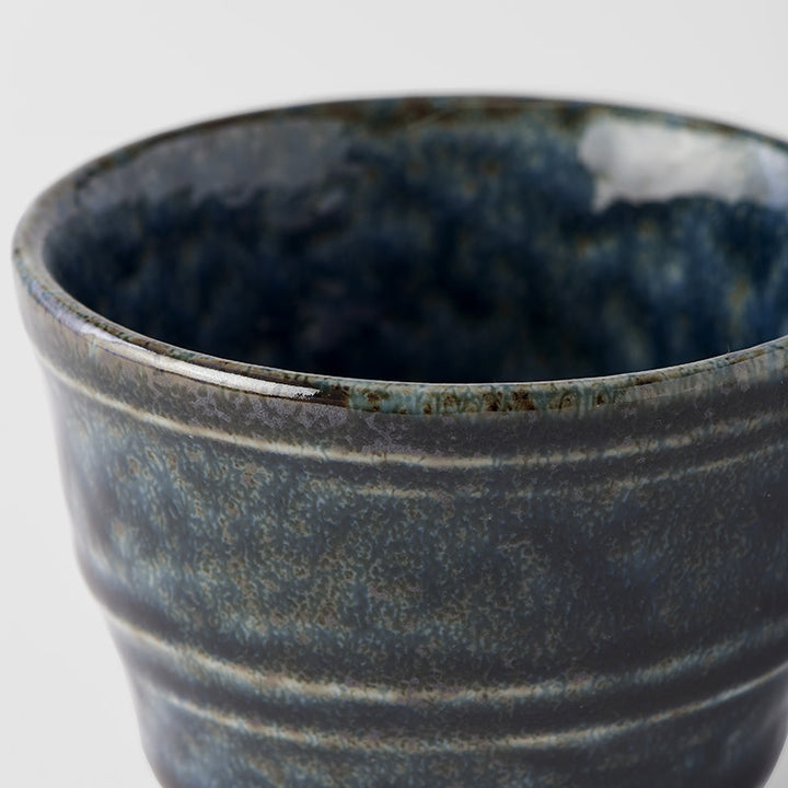 Save on Coffee Cup 7cm / Midnight Blue Glaze Made in Japan at BEON. The Midnight Blue range is designed and made in Gifu prefecture, Japan.6.8cm diameter6.7cm heightMade of 'Minoyaki' porcelain, fired at a high temperature and hand finished in Gifu prefecture, Japan. Featuring a dark indigo gloss with subtle brown undertones. The glaze runs over a pattern of concentric circles. It works in perfect harmony with the rustic shapes made by this kiln. This kiln is situated in the foot hills of the alpine region