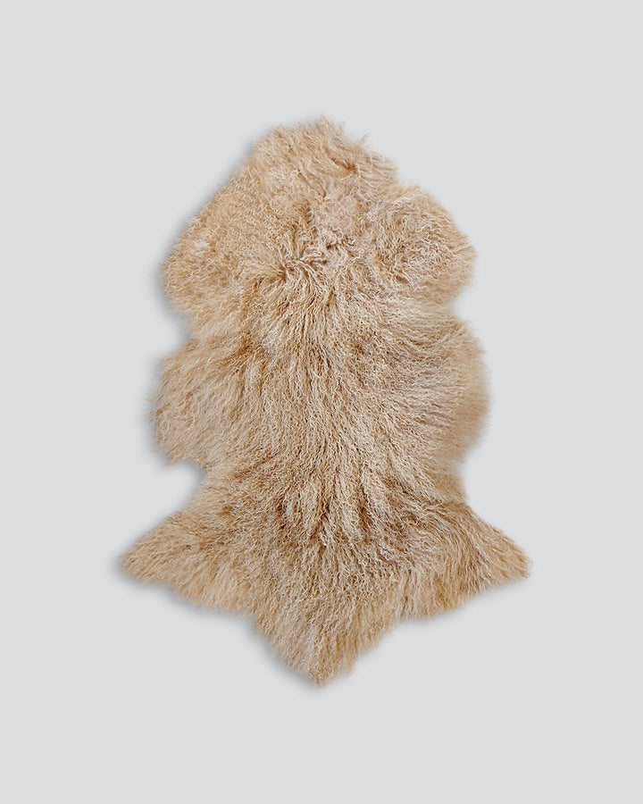 Meru Tibetan Lamb Hide Bring a warm and cosy feel to a room with the impossibly soft texture of Tibetan lamb fur. Gorgeously shaggy with a natural curl, our Meru hide adds sumptuous texture and an element of nature into your space. This restful silver ton