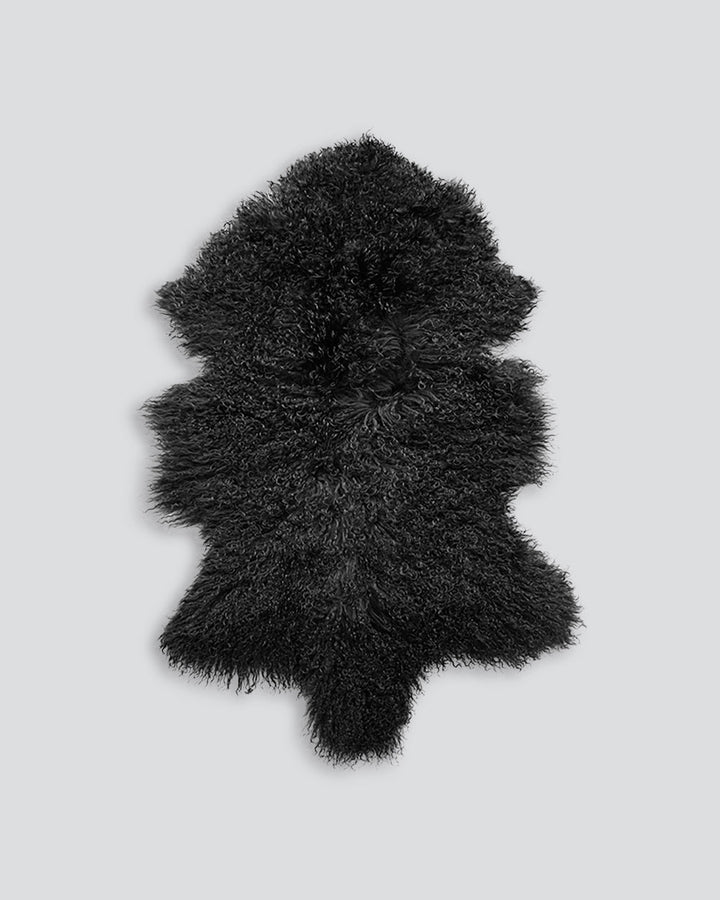 Meru Tibetan Lamb Hide Bring a warm and cosy feel to a room with the impossibly soft texture of Tibetan lamb fur. Gorgeously shaggy with a natural curl, our Meru hide adds sumptuous texture and an element of nature into your space. This restful silver ton