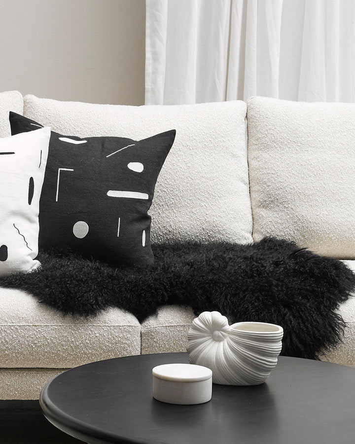 Meru Tibetan Lamb Hide Bring a warm and cosy feel to a room with the impossibly soft texture of Tibetan lamb fur. Gorgeously shaggy with a natural curl, our Meru hide adds sumptuous texture and an element of nature into your space. This restful silver ton