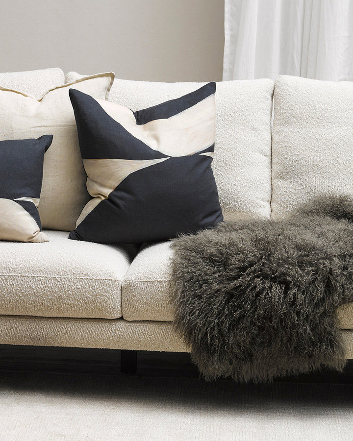 Meru Tibetan Lamb Hide Bring a warm and cosy feel to a room with the impossibly soft texture of Tibetan lamb fur. Gorgeously shaggy with a natural curl, our Meru hide adds sumptuous texture and an element of nature into your space. This restful silver ton