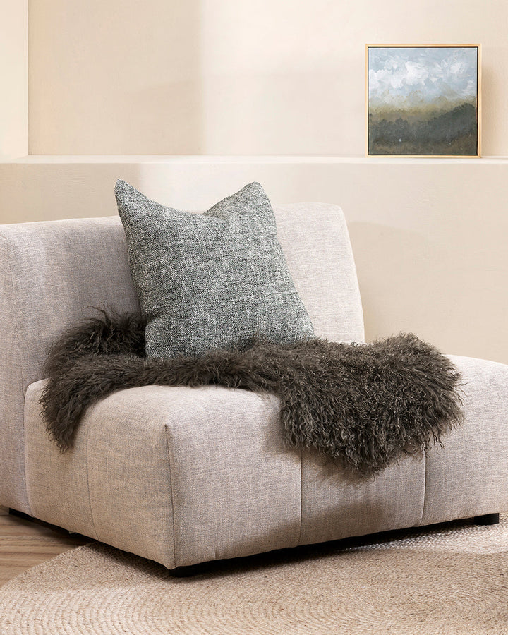 Meru Tibetan Lamb Hide Bring a warm and cosy feel to a room with the impossibly soft texture of Tibetan lamb fur. Gorgeously shaggy with a natural curl, our Meru hide adds sumptuous texture and an element of nature into your space. This restful silver ton
