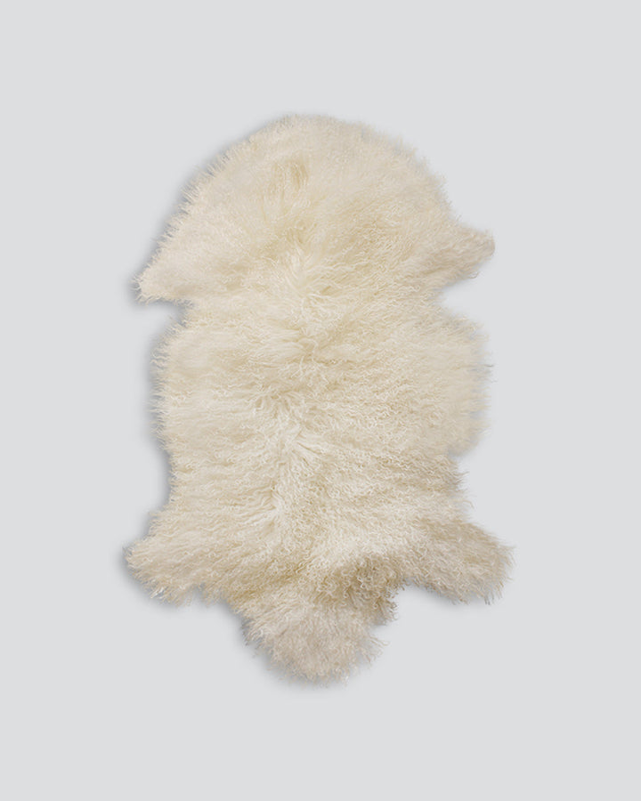 Meru Tibetan Lamb Hide Bring a warm and cosy feel to a room with the impossibly soft texture of Tibetan lamb fur. Gorgeously shaggy with a natural curl, our Meru hide adds sumptuous texture and an element of nature into your space. This restful silver ton