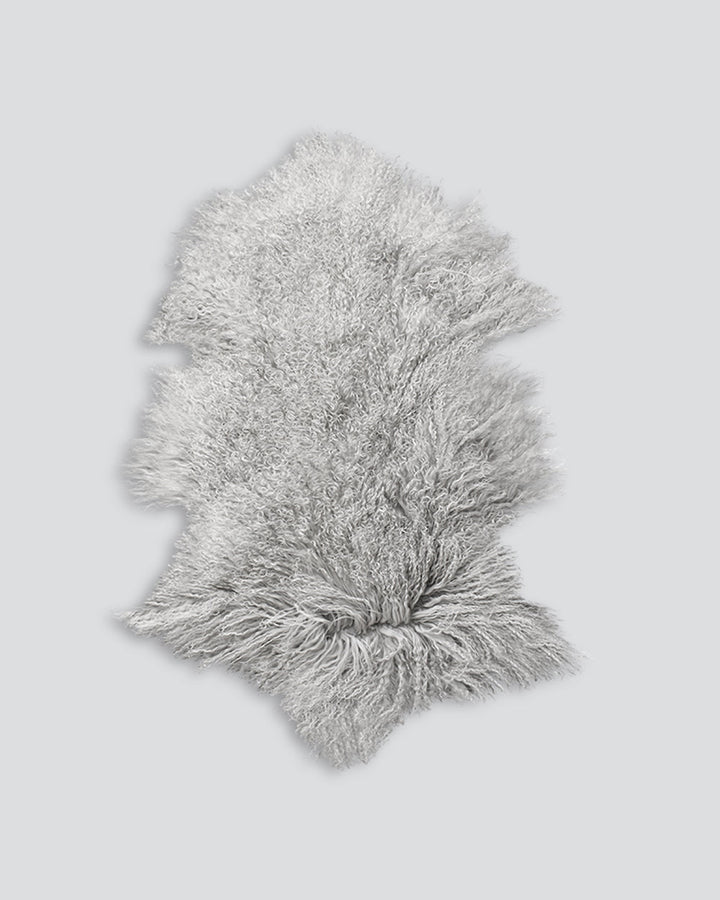 Meru Tibetan Lamb Hide Bring a warm and cosy feel to a room with the impossibly soft texture of Tibetan lamb fur. Gorgeously shaggy with a natural curl, our Meru hide adds sumptuous texture and an element of nature into your space. This restful silver ton