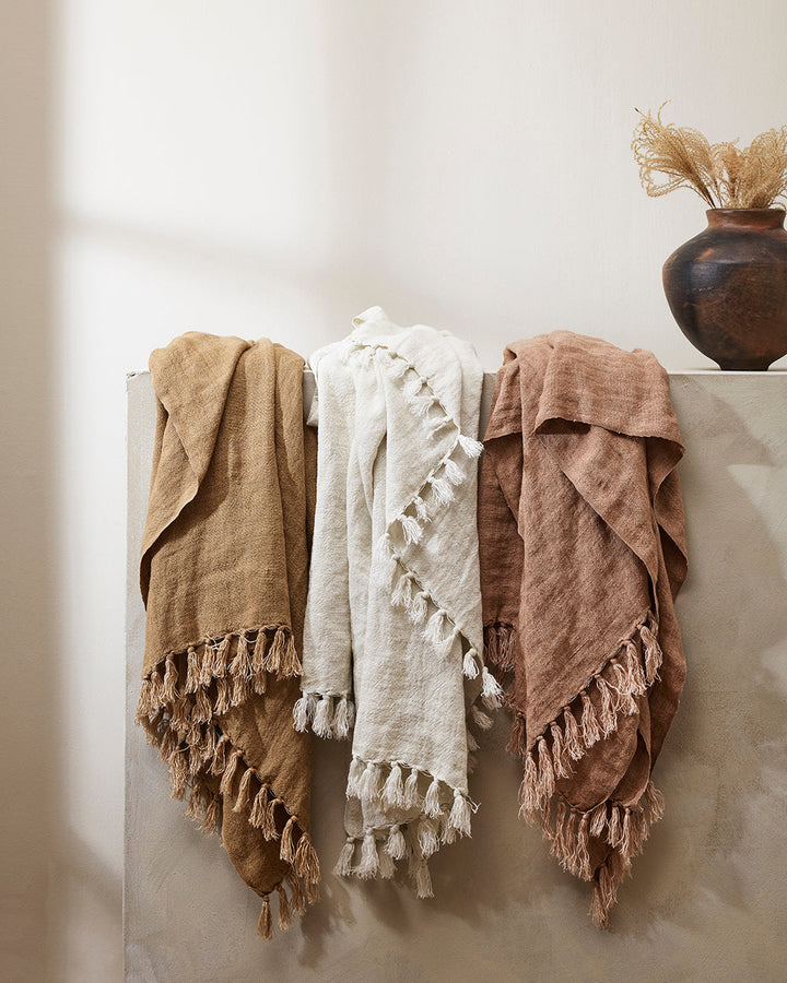 Millhouse Throw Handwoven using linen fibres that have been carefully batch-dyed to our specifications, the Millhouse’s minimal design and natural, earthy tone adds a sense of timeless elegance to spaces. Rich in character and texture, each piece is finis