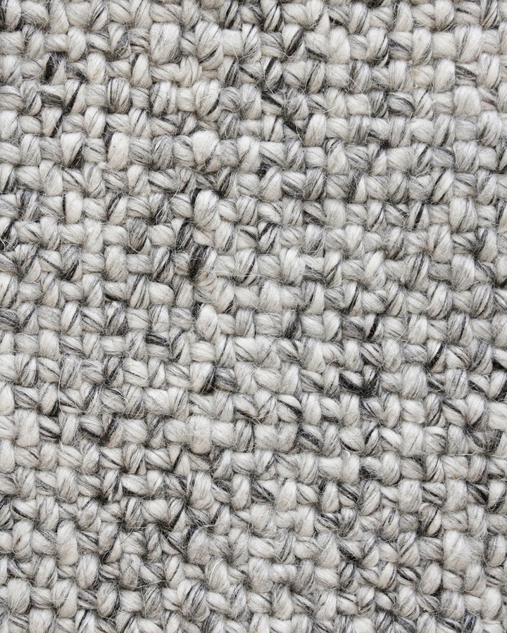 Nebraska Floor Runner Create a contemporary feel in any entrance or passageway with this simple wool-blend runner in a soft ash tone. This piece brings warmth and interest to transition spaces with its subtle mottled tone and versatile flatweave structure
