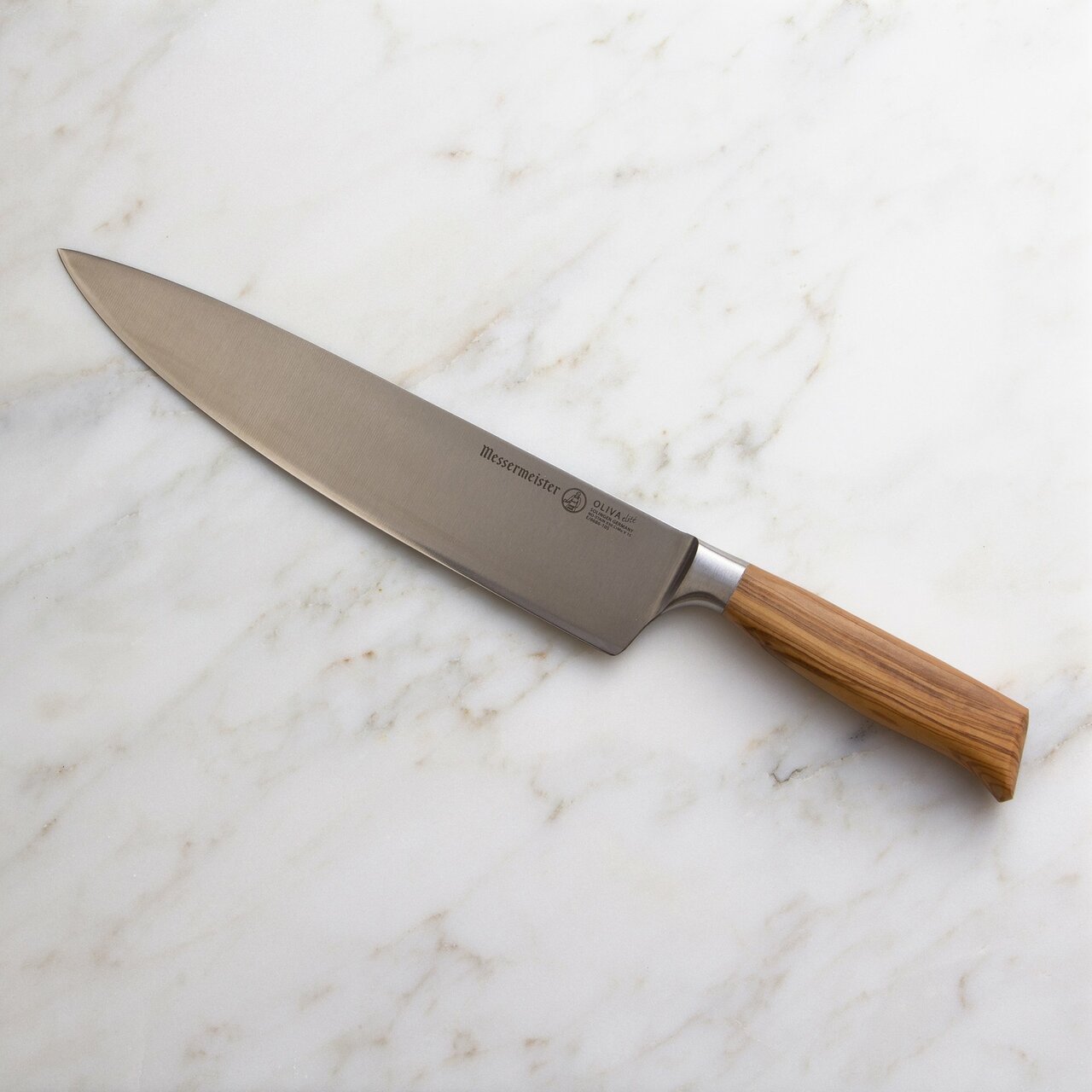 BEON.COM.AU E6686 10S       Oliva Elite Stealth Chef’s Knife The Messermeister Oliva Elite Stealth Chef’s Knife is the workhorse of all the knives. You will gravitate towards it when executing 90% of your culinary tasks. It has a highly figured Italian olive wood handle attached to a hand forged Stealth blad... Messermeister at BEON.COM.AU