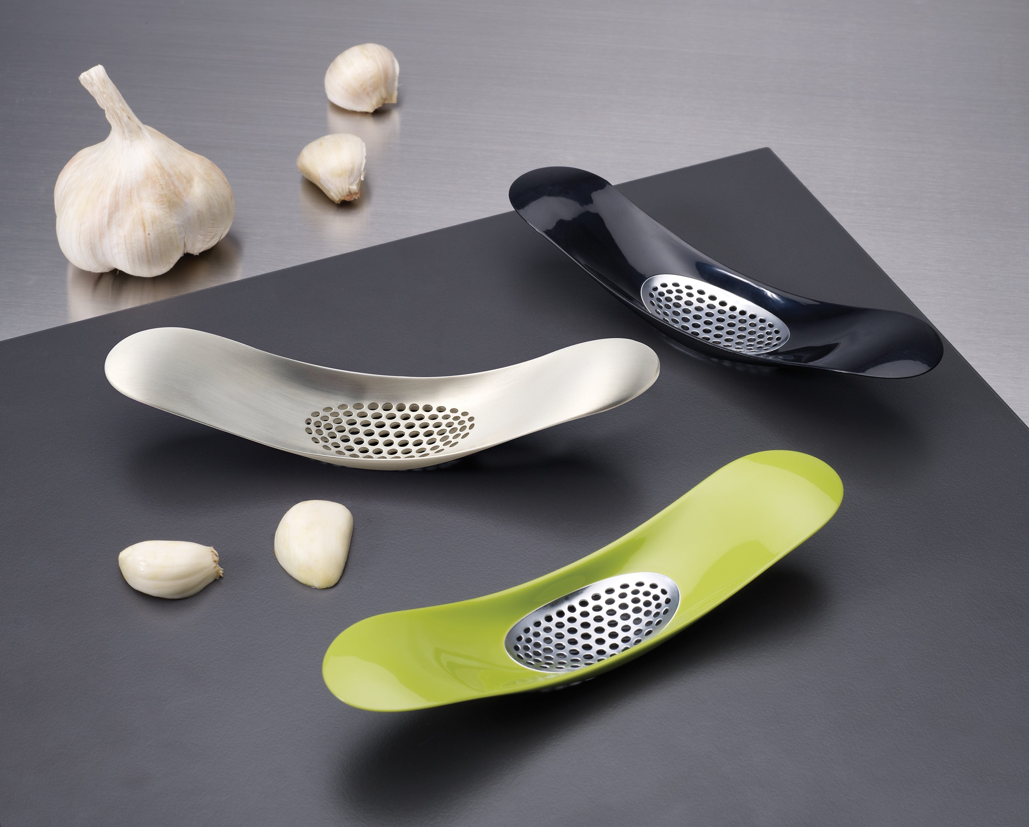 BEON.COM.AU  By using downward pressure and a ‘rocking’ motion, this stylish tool crushes garlic cloves quickly and easily without leaving any garlic odour on your hands.  Crush garlic by pushing and rocking back and forth over cloves Crushed garlic collected in bowl shaped design Can easily be scooped into ... Joseph Joseph at BEON.COM.AU
