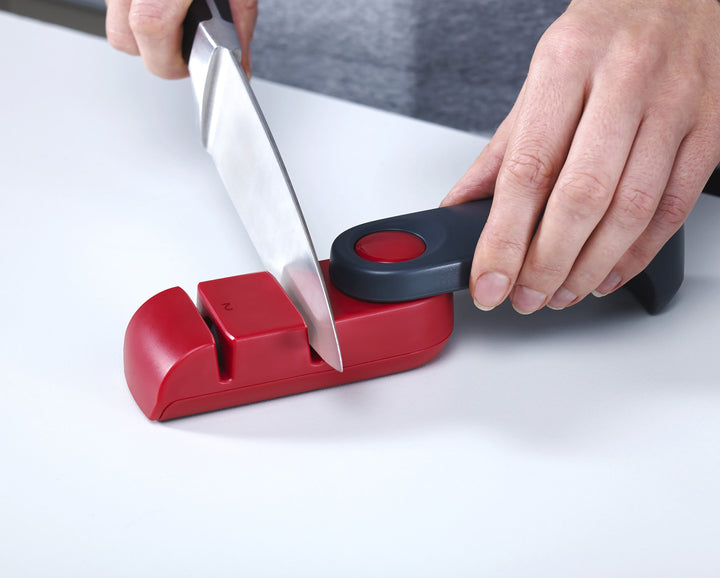 Buy online & save Rota™ Folding Knife Sharpener | BEON.COM.AU  This stylish rotating knife sharpener can be neatly folded away for compact storage.  Twin ceramic sharpening wheels; course and fine Easy-grip handle and non-slip feet for added stability when sharpening Locks closed for compact storage Unique swivelling design  Specifications Care & use:  ... Joseph Joseph at BEON.COM.AU