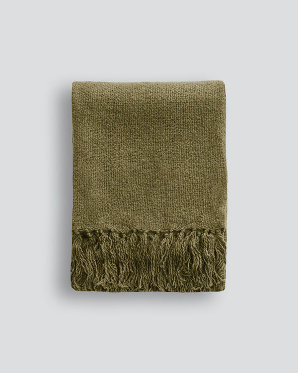 Serenade Throw Add softness and warmth to your space with this richly toned throw. Featuring a luxurious tasselled edge, the Serenadeâ€™s soft brushed acrylic invites you to relax and unwind. The simple design and colourway work as easy complements to any