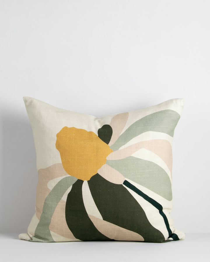 Verona Cushion A simplified daisy form is captured in a palette of sage, butter, biscuit, and bottle green in this uplifting cushion. Screen-printed onto a dense cotton base, Veronaâ€™s playful, free-spirited design feels fresh and summery when styled wit