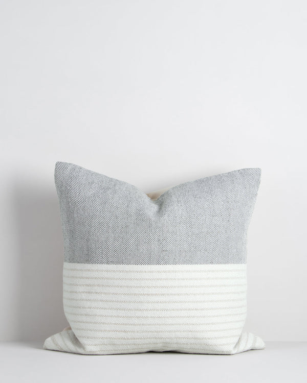 Willett Cushion Elevate your outdoors with the soft grey and white colourway of our Willett cushion. Handwoven from 100% PET yarn (a soft and supple fibre produced by recycling plastic bottles), the Willet pairs effortlessly with Corbett to create a conte