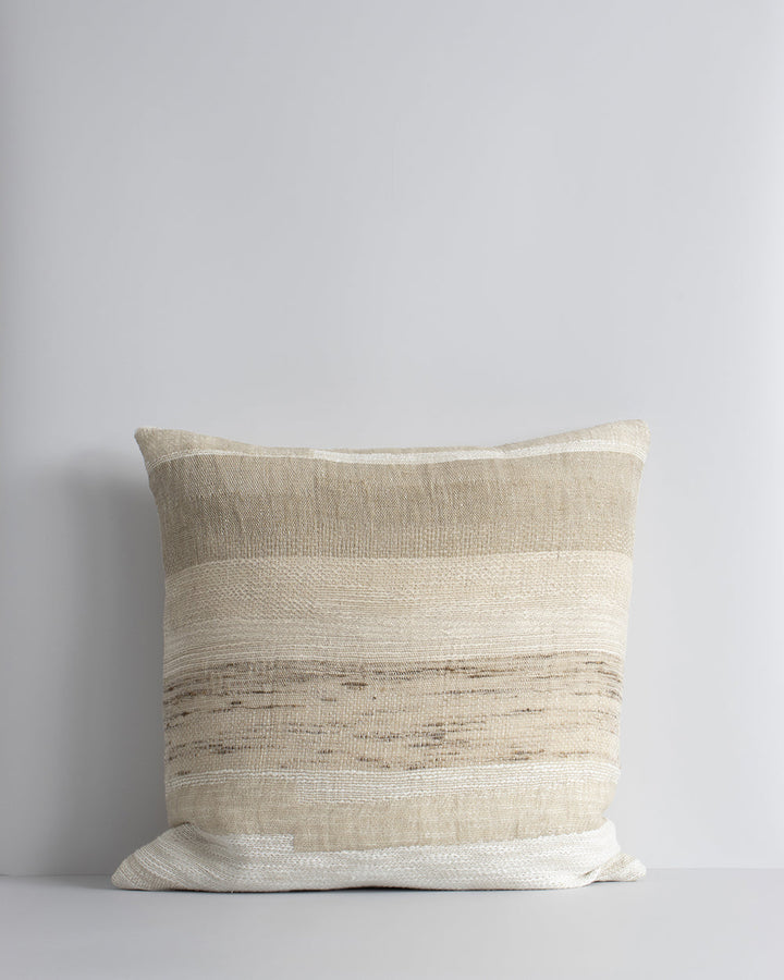 Woodrow Cushion Revive and renew through the power of simple design, handcrafted details and natural fibres. Simplicity reigns supreme in our beautifully pared-back Woodrow cushion. Raw, slubby linen is blended with cotton and silk to create a wide linear